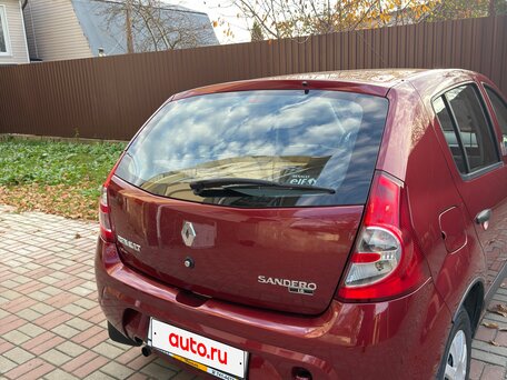 2011 Renault Sandero I, красный, 860500 рублей, вид 3