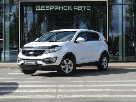 2015 Kia Sportage III Рестайлинг, белый, 1430000 рублей, вид 1