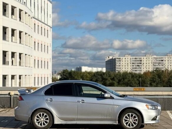 2011 Mitsubishi Lancer X Рестайлинг, серебристый, 660000 рублей - вид 8