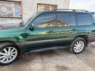 2006 Toyota Land Cruiser 100 Series Рестайлинг 2, зелёный, 3050000 рублей, вид 2