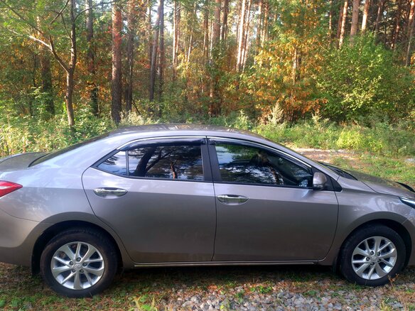 2014 Toyota Corolla XI (E160, E170, E180), золотистый, 1800000 рублей - вид 6