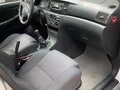 2003 Toyota Corolla IX (E120, E130), серебристый - вид 5