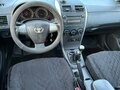 2011 Toyota Corolla X (E140, E150) Рестайлинг, чёрный, 750000 рублей - вид 6