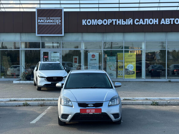 2011 Kia Rio II Рестайлинг, серебристый - вид 1