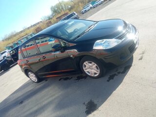 2010 Nissan Tiida I Рестайлинг, коричневый, 750000 рублей, вид 1