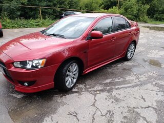 2008 Mitsubishi Lancer X, красный, 695000 рублей, вид 1