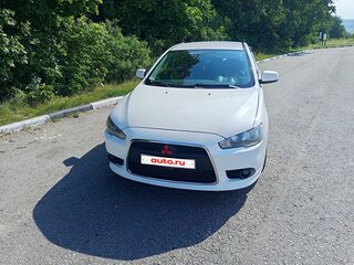 2011 Mitsubishi Lancer X Рестайлинг, белый, 750000 рублей, вид 4