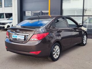 2016 Hyundai Solaris I Рестайлинг, коричневый, 1015000 рублей, вид 5