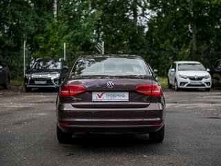 2015 Volkswagen Jetta VI Рестайлинг, коричневый, 1060000 рублей, вид 4