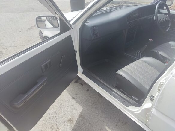 1988 Toyota Corolla VI (E90), белый, 385000 рублей - вид 24