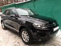2014 Volkswagen Touareg II, чёрный - вид 2