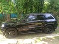 2012 Jeep Grand Cherokee IV (WK2), чёрный - вид 1