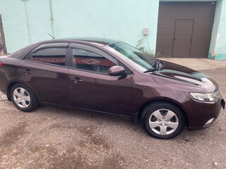 2011 Kia Cerato 6-speed II, пурпурный, 820000 рублей, вид 4