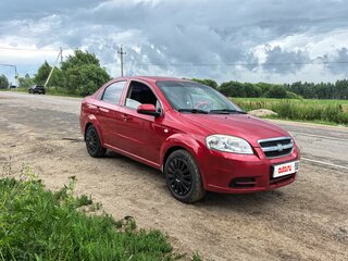 2011 Chevrolet Aveo I Рестайлинг, красный, 350000 рублей, вид 1