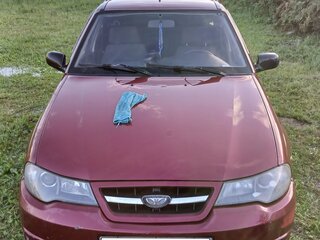 2009 Daewoo Nexia I Рестайлинг, пурпурный, 130000 рублей, вид 3