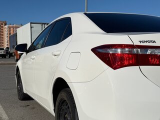 2013 Toyota Corolla XI (E160, E170, E180), белый, 1350000 рублей, вид 5