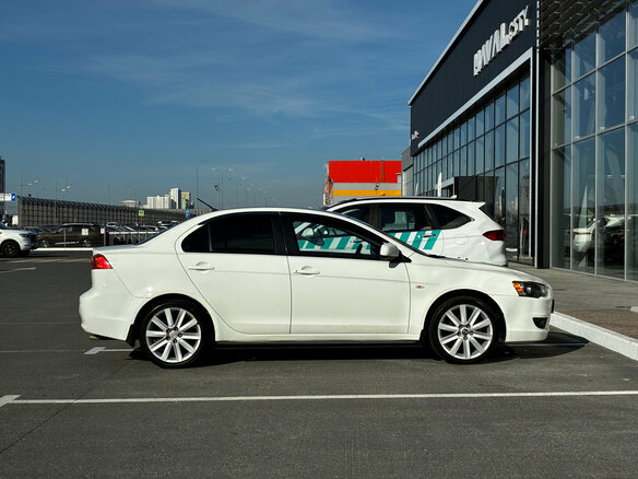 2007 Mitsubishi Lancer X, белый - вид 4