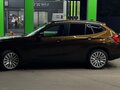 2013 BMW X1 20i I (E84) Рестайлинг, коричневый, 1300000 рублей - вид 3