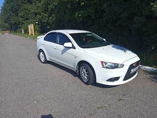 2011 Mitsubishi Lancer X Рестайлинг, белый, 750000 рублей, вид 2