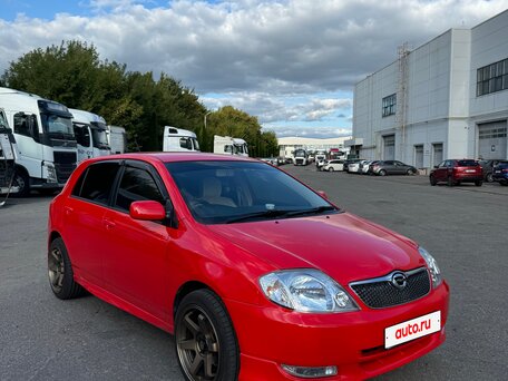 2002 Toyota Corolla Runx IX (E120, E130), красный, 750000 рублей, вид 3
