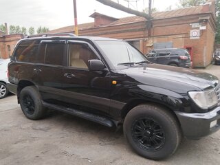 2003 Toyota Land Cruiser 100 Series Рестайлинг 1, чёрный, 1600000 рублей, вид 3