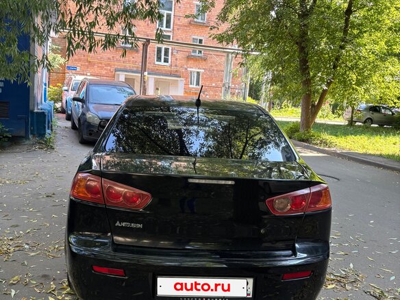 2008 Mitsubishi Lancer X, чёрный, 540000 рублей - вид 3
