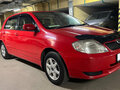 2001 Toyota Corolla Runx IX (E120, E130), красный, 450000 рублей - вид 1
