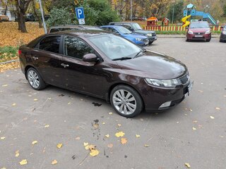 2011 Kia Cerato 6-speed II, пурпурный, 700000 рублей, вид 2