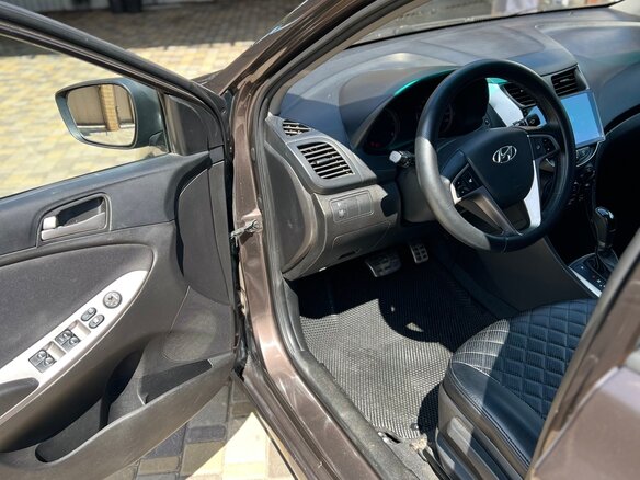 2014 Hyundai Solaris I Рестайлинг, коричневый, 849000 рублей - вид 7