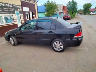 2006 Mitsubishi Lancer IX Рестайлинг, чёрный, 450000 рублей, вид 3