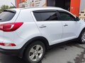 2012 Kia Sportage III, белый, 1350000 рублей - вид 2