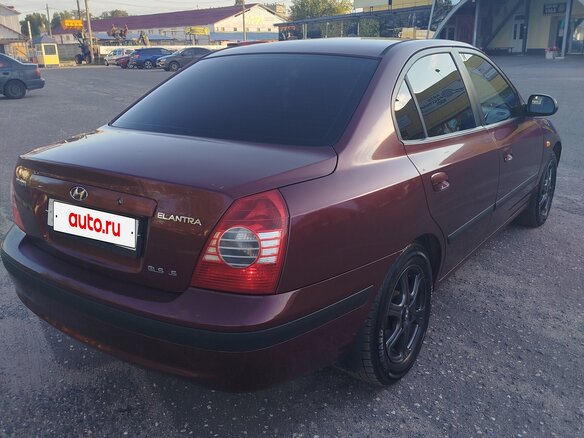 2010 Hyundai Elantra ТагАЗ III (XD2) Рестайлинг, красный - вид 4