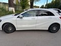 2014 Mercedes-Benz A-Класс 180 III (W176), белый - вид 1