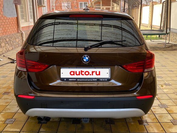 2011 BMW X1 20i I (E84), коричневый, 1850000 рублей - вид 11
