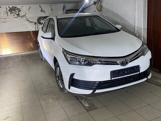 2017 Toyota Corolla XI (E160, E170, E180) Рестайлинг 1, белый, 2500000 рублей, вид 3