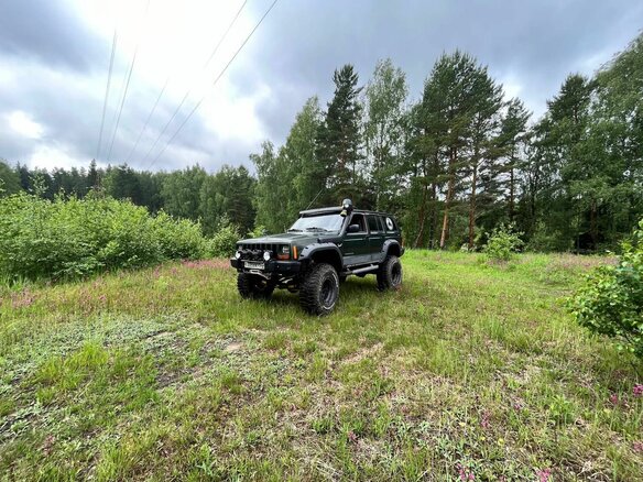 1997 Jeep Cherokee II (XJ) Рестайлинг, зелёный - вид 22