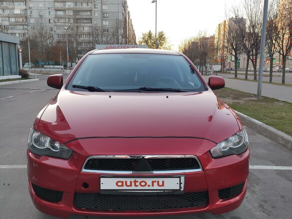 2008 Mitsubishi Lancer X, красный - вид 2