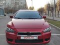 2008 Mitsubishi Lancer X, красный - вид 2