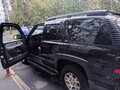 2002 Chevrolet Tahoe II, чёрный - вид 3