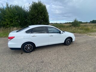 2014 Nissan Almera III (G15), белый, 530000 рублей, вид 2