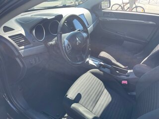2012 Mitsubishi Lancer X Рестайлинг, чёрный, 615000 рублей, вид 4