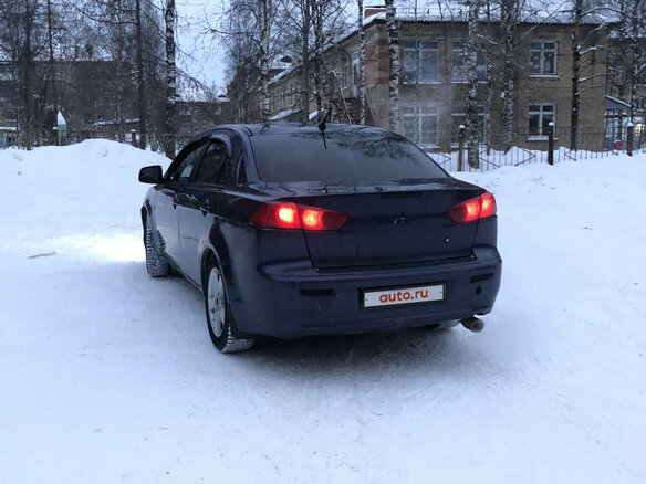 2008 Mitsubishi Lancer X, синий - вид 1