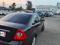 2008 Ford Focus II Рестайлинг, фиолетовый - вид 4