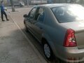 2010 Renault Logan I Рестайлинг, бежевый, 620000 рублей - вид 2