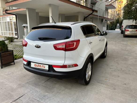 2012 Kia Sportage III, белый, 950000 рублей - вид 4