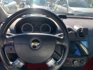 2010 Chevrolet Aveo I Рестайлинг, красный, 310000 рублей, вид 4