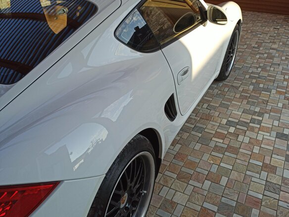 2009 Porsche Cayman I (987) Рестайлинг, белый - вид 3