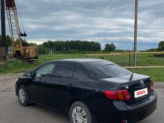 2009 Toyota Corolla X (E140, E150), чёрный, 700000 рублей, вид 5