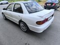 1991 Mitsubishi Lancer VI, белый - вид 3
