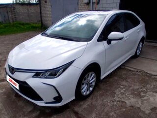 2021 Toyota Corolla XII (E210), белый, 1850000 рублей, вид 2